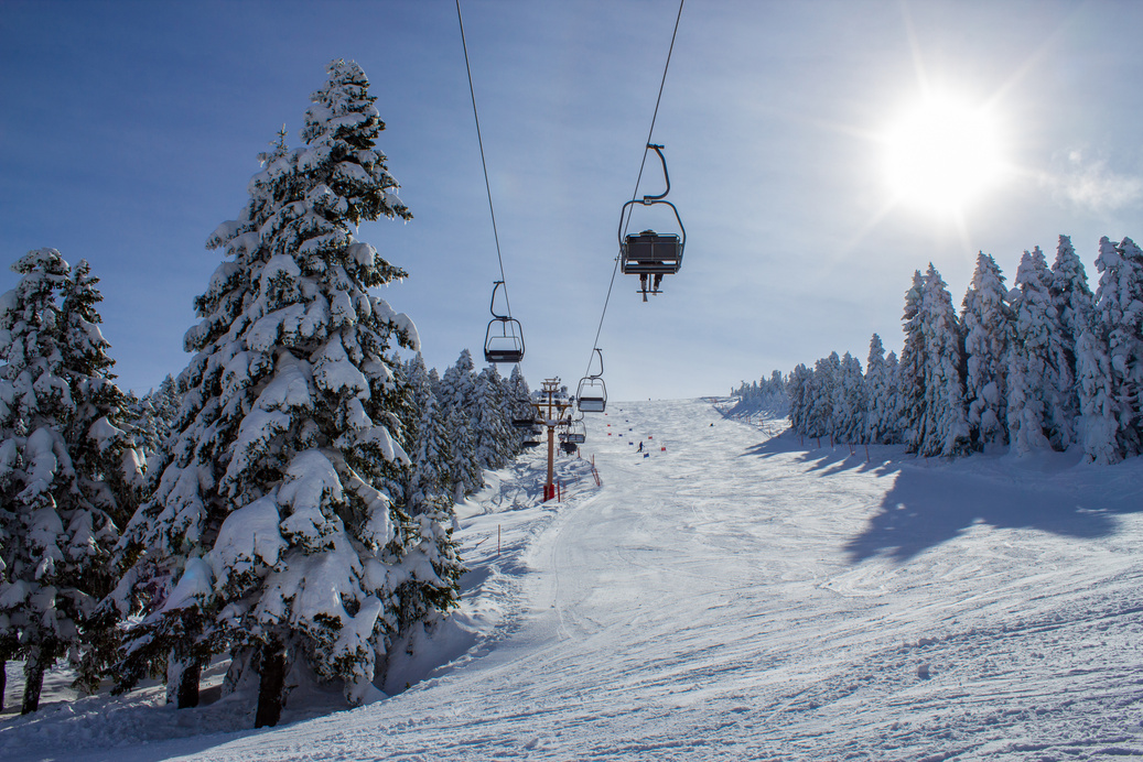 Winter ski resort,ski lift,people skiing. Uludag Mountain, Bursa, Turkey